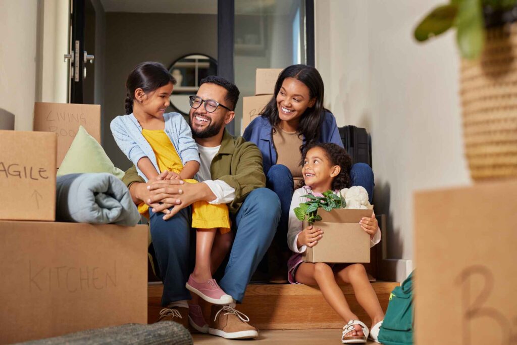 First time homeowners happily smiling